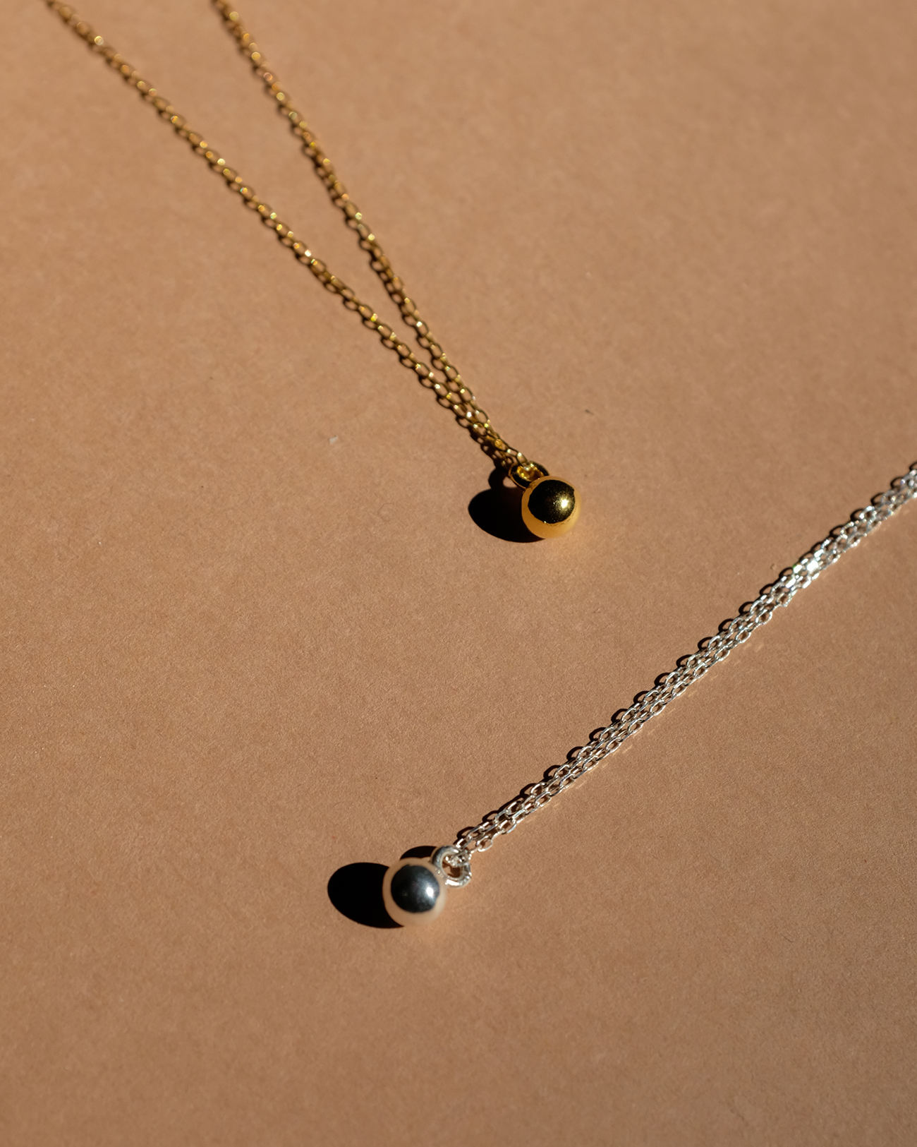 metaformi_design_jewelry_gold_silver_ball_necklace